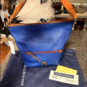 Dooney and Bourke Large Pebble Grain Hobo in the color Marine Blue.